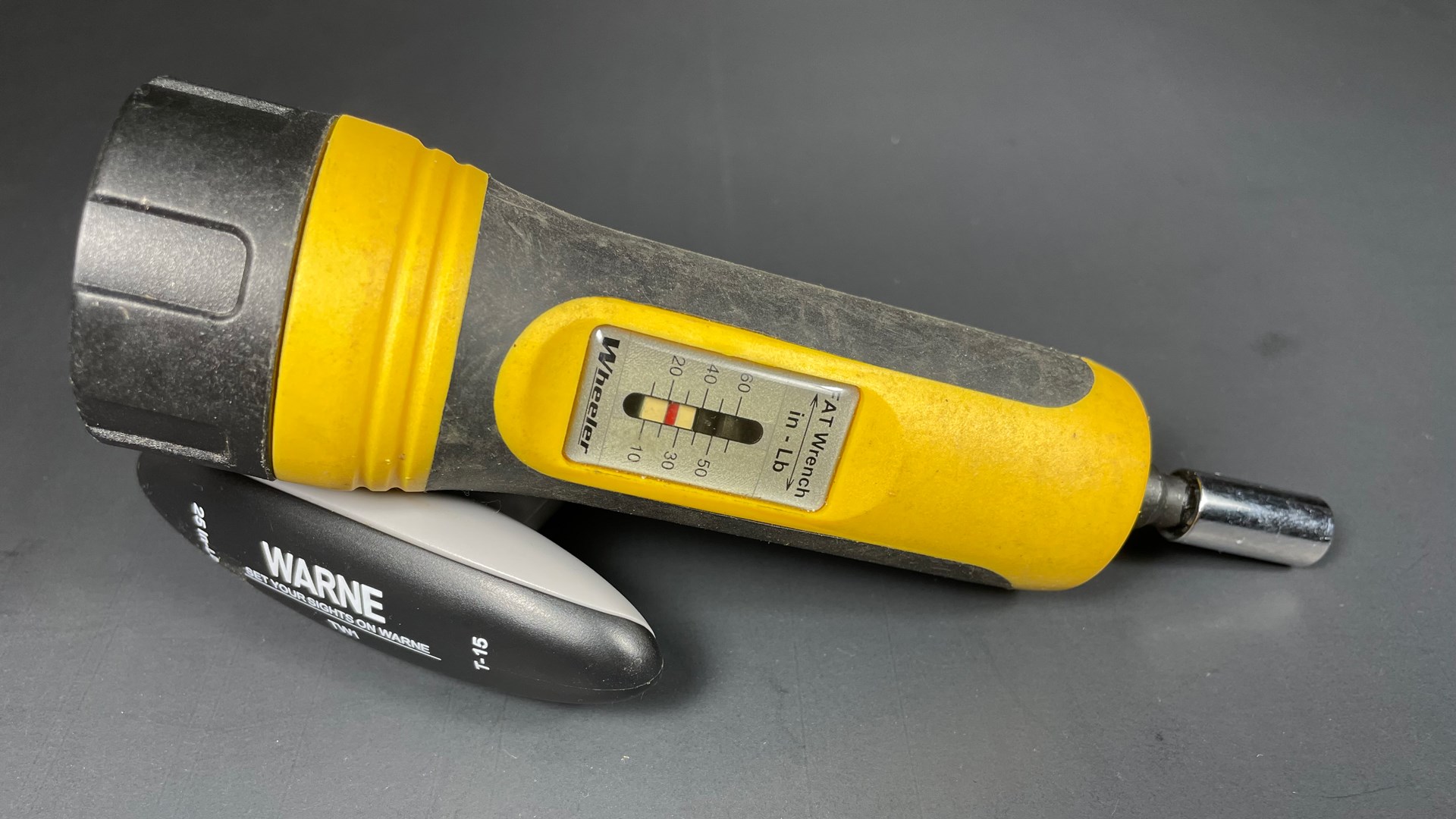 yellow and black torque wrench wheeler warne wrenches