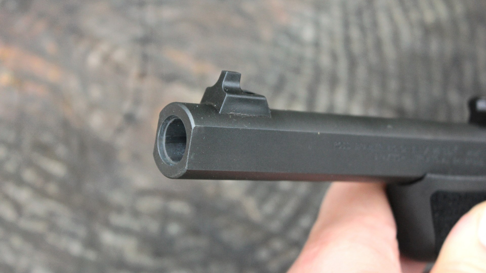 Rossi Brawler barrel steel black metal muzzle hole rifling front sight detail closeup of gun part