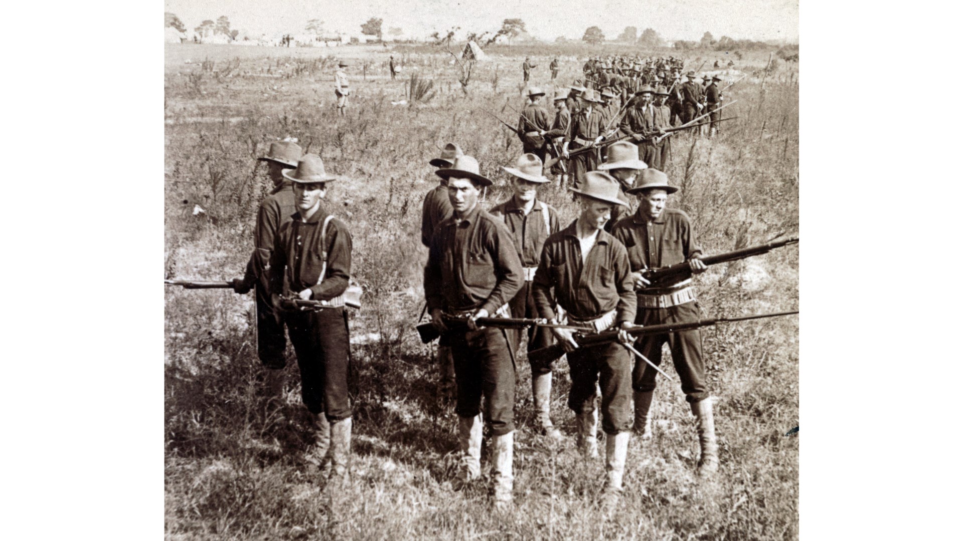 U.S. Army infantrymen with Trapdoor Springfield rifles with fixed bayonets practicing a “defensive line” formation, 1898. Courtesy of Tom Laemlein.