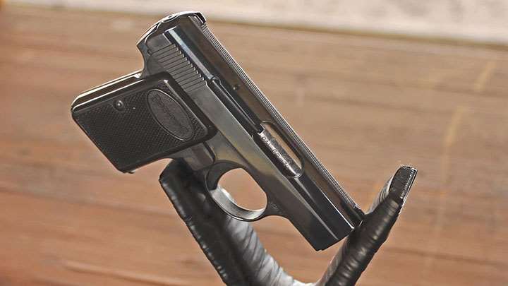The Baby Browning on a pistol rest at the range.