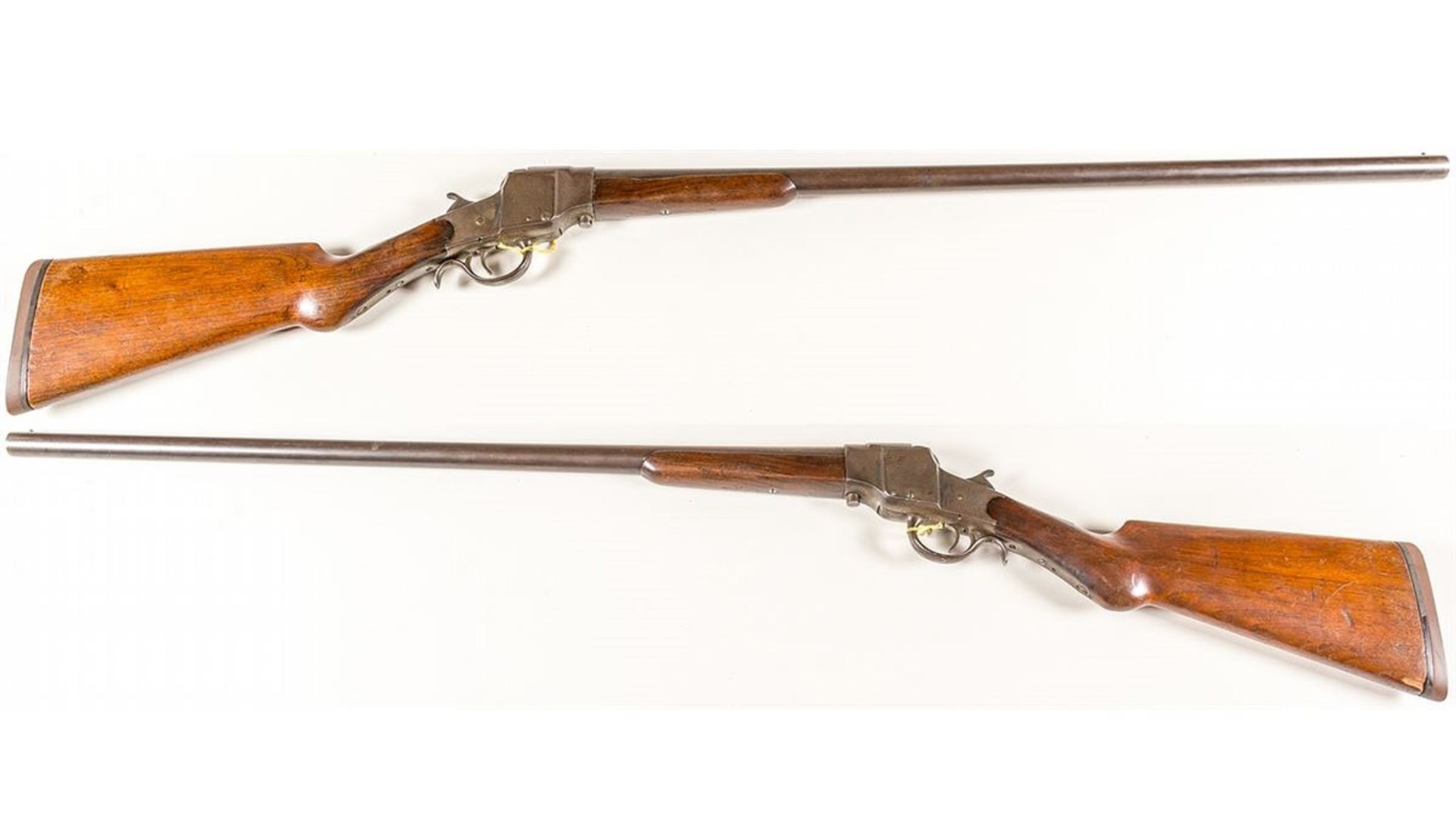 Hopkins & Allen falling block 16-ga. shotgun left- and right-side views on white background wood stock guns