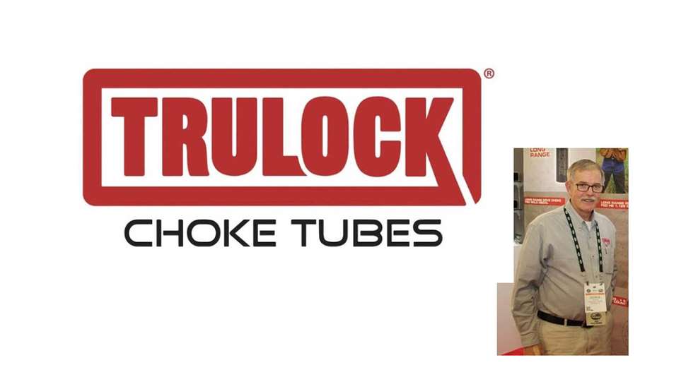 George Trulock portrait with company logo banner red and black text