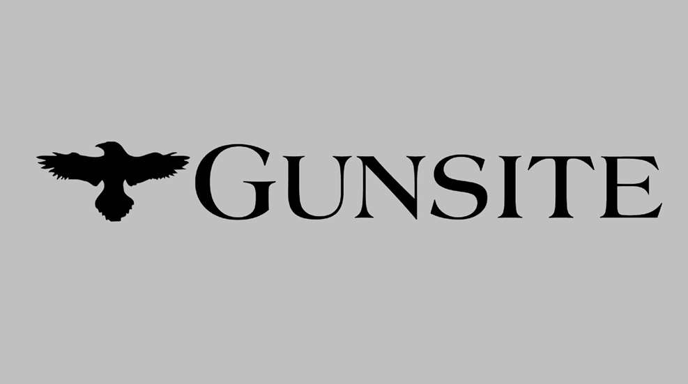 Gunsite black font text with crow logo
