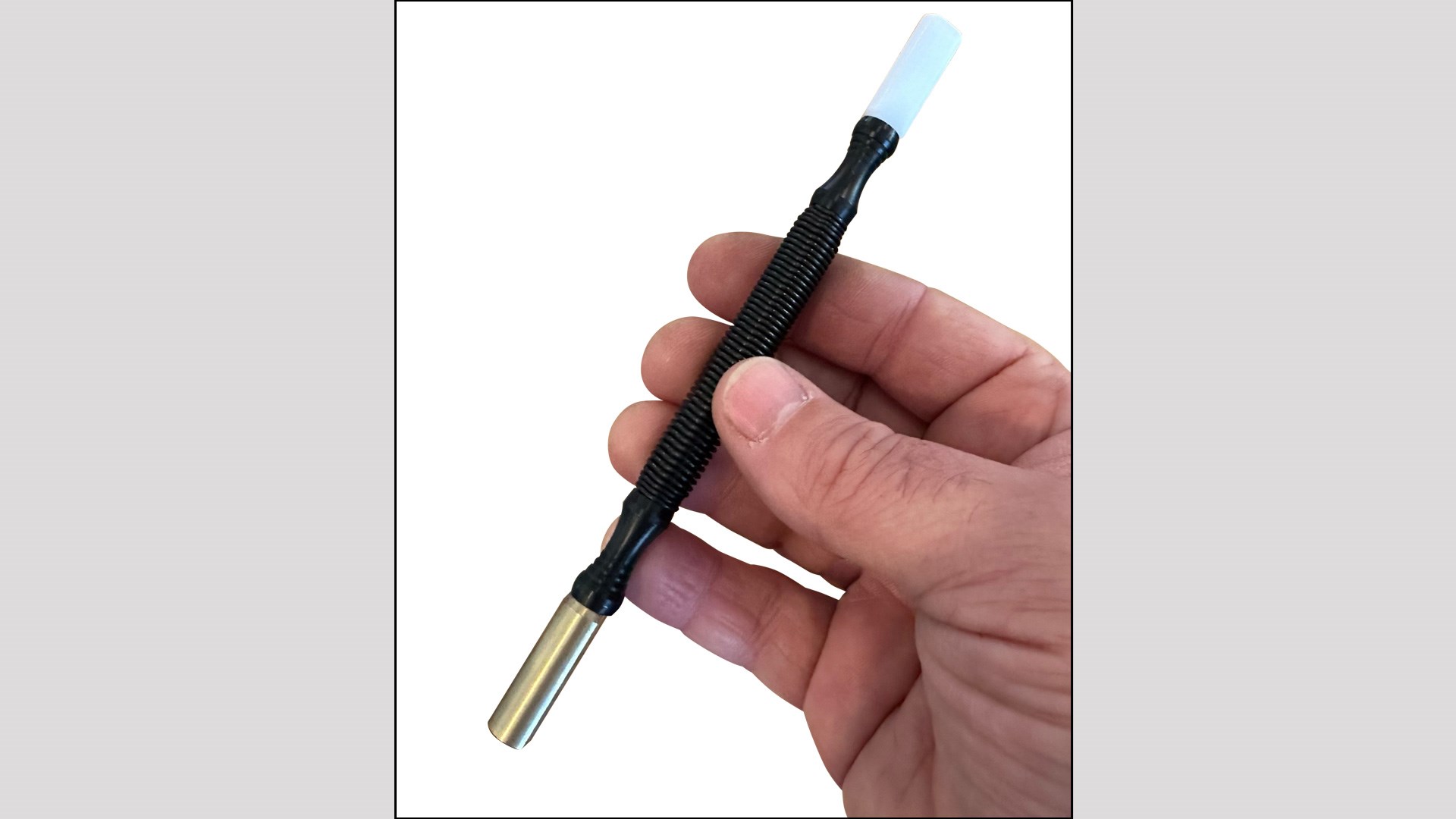 Wyoming Sight Drifter tool held in right hand