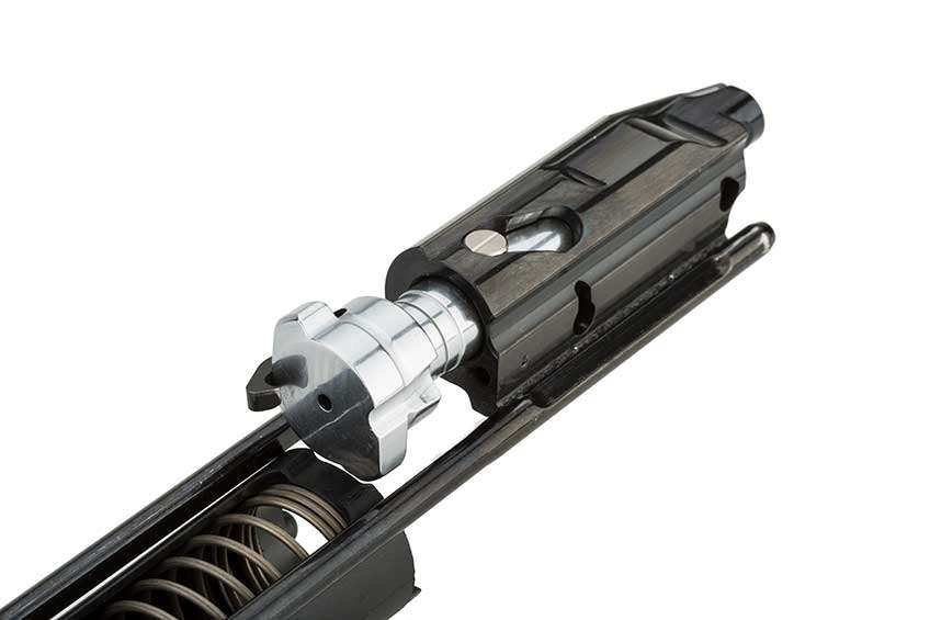 Close-up of the Beretta A400 Xplor Action shotgun&#x27;s bolt head and bolt body shown on white.