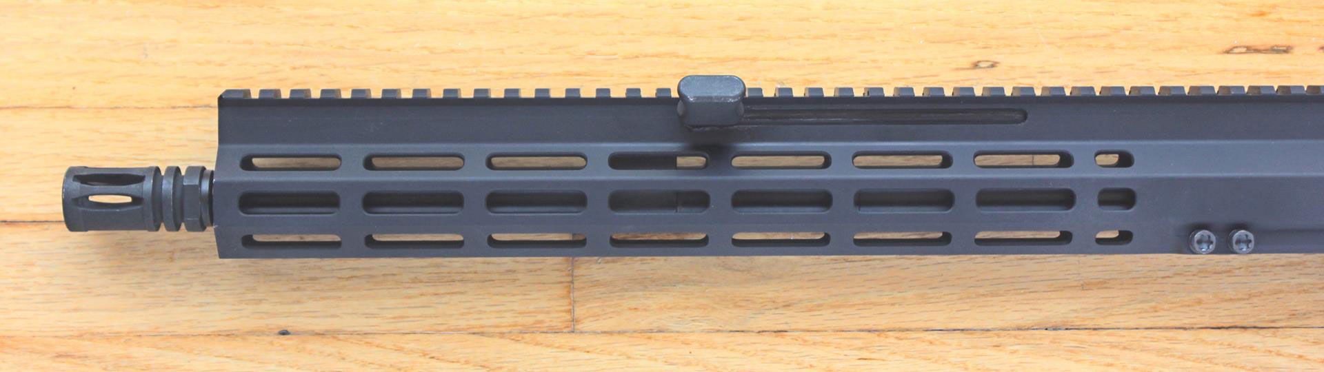 The four-position charging handle rests 10” in front of the magazine well.