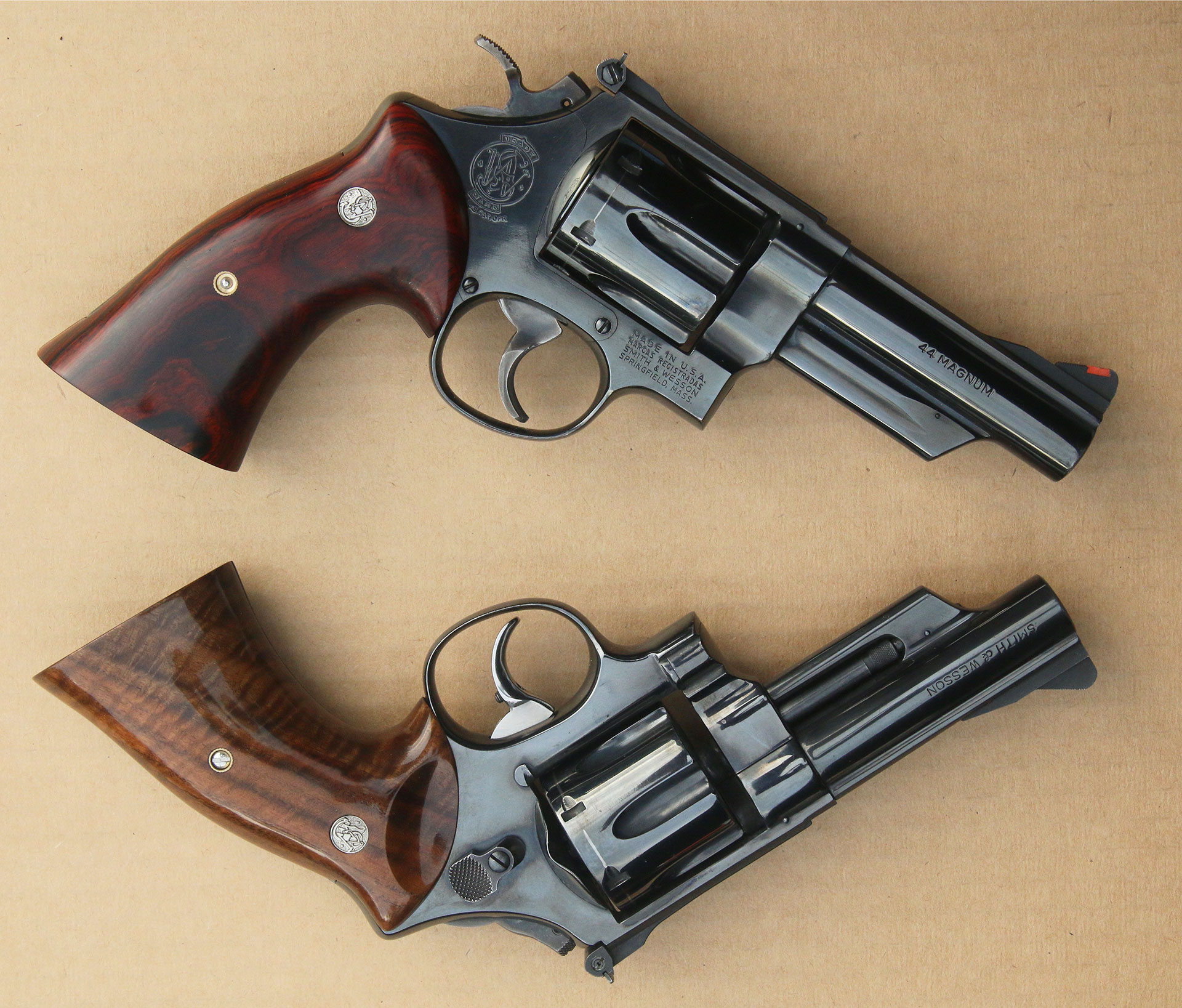 The author's Smith & Wesson Model 29-2 (top) and custom 1955 Target (bottom) with the Culina wood grips installed.