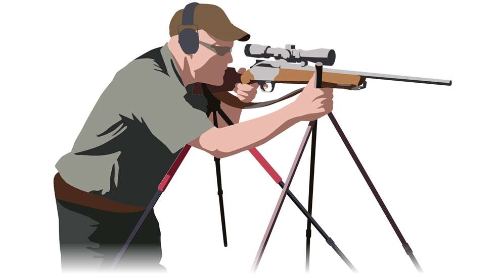 shooter with Three-legged shooting sticks