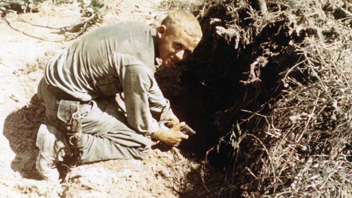 A GI of the 25th Infantry Division at the entrance to a VC tunnel during Operation Atlanta in the Iron Triangle area, December, 1967.