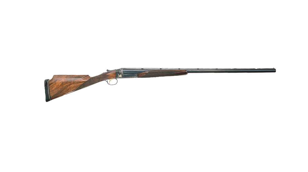 RIght side of shotgun side-by-side gun wood metal steel engraving gold