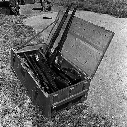 A mixed crate of vz. 52/57 rifles and M44 carbines.