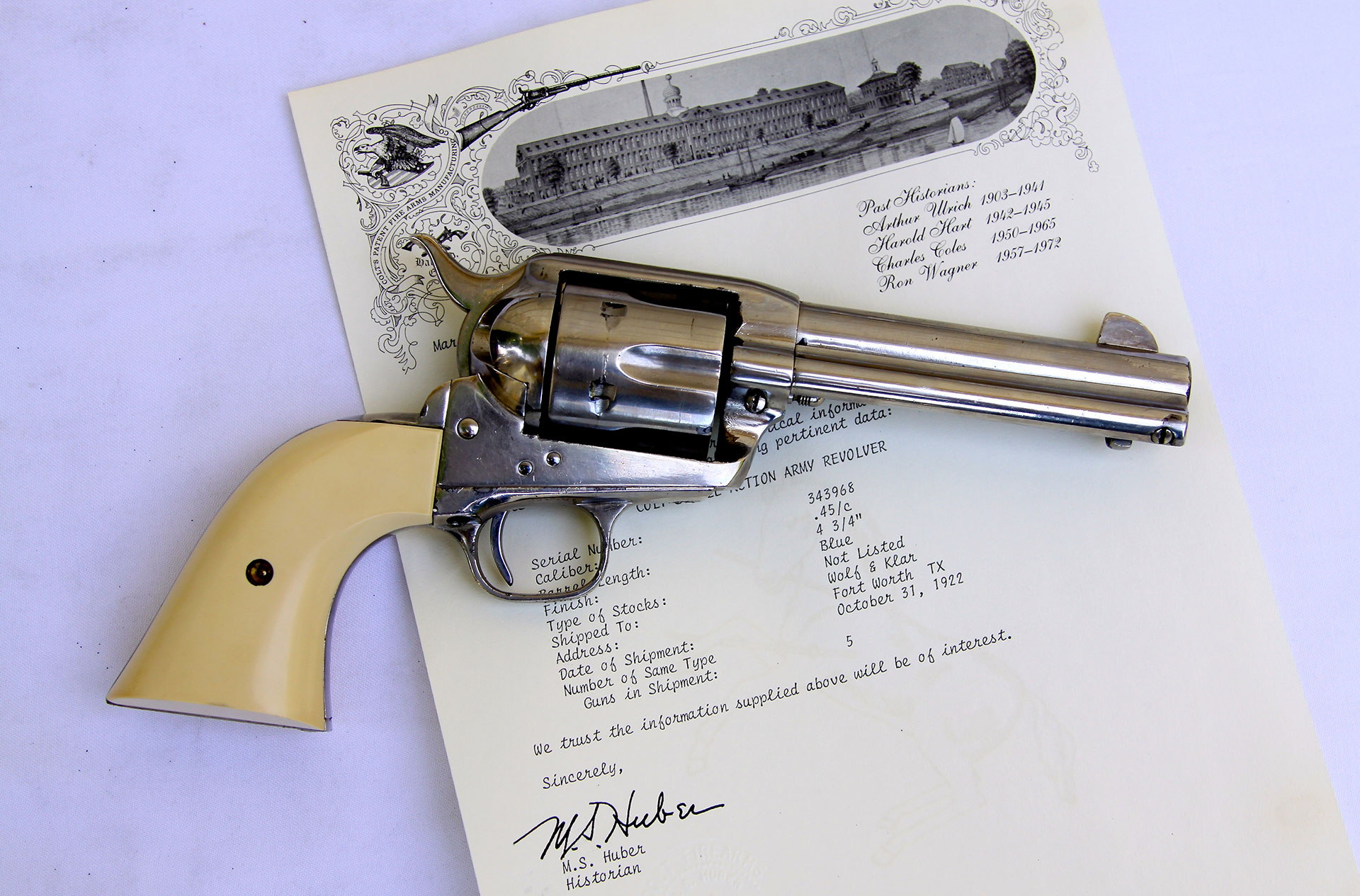 On October 31st, 1922, this .45 caliber Colt Single Action Army was sent to Wolf & Klar. Originally blued and case hardened, the gun sports an old nickel refinish and non-original grips, but still maintains its Texas cowboy allure.