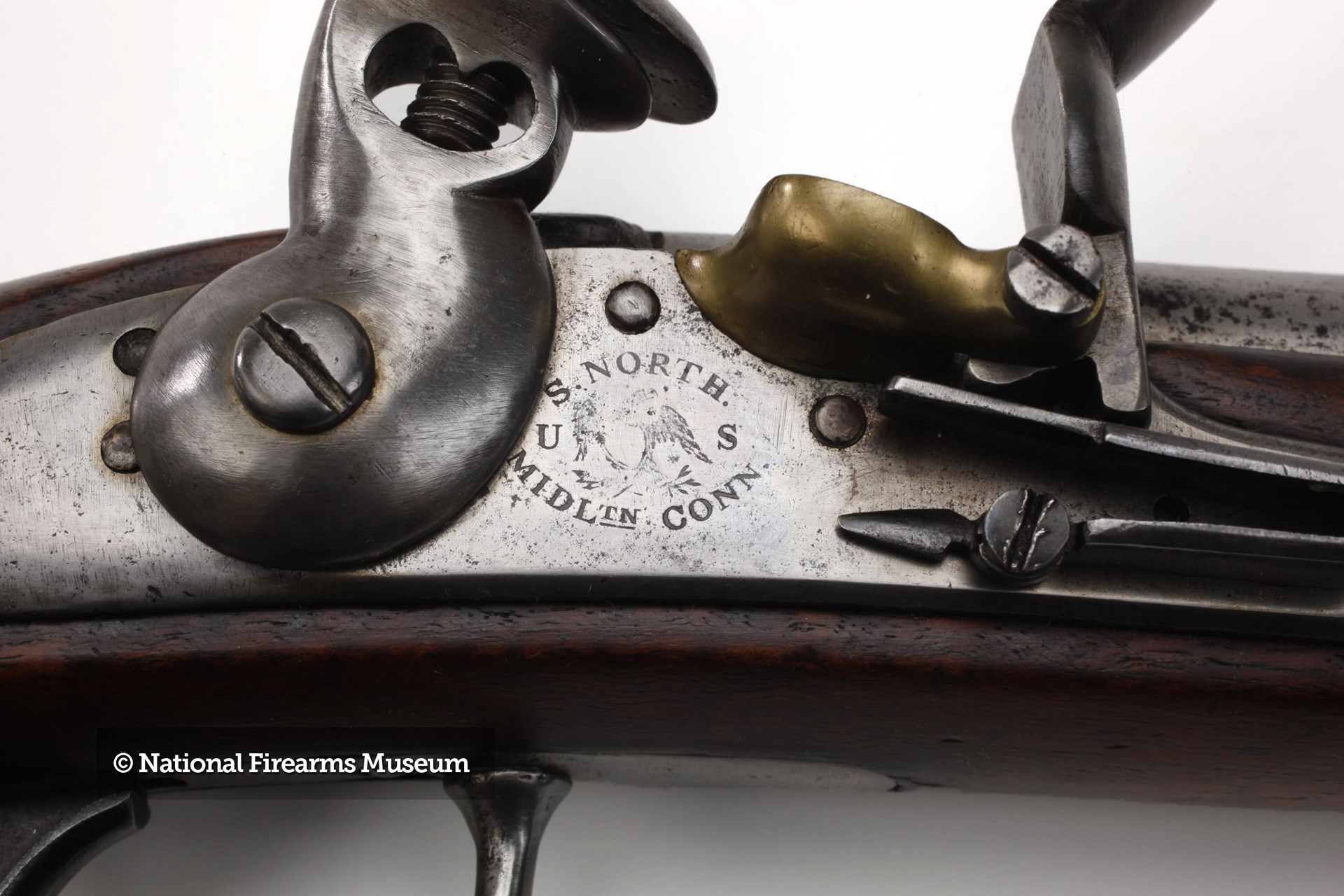 Simeon North flintlock handgun lockplate closeup national firearms museum