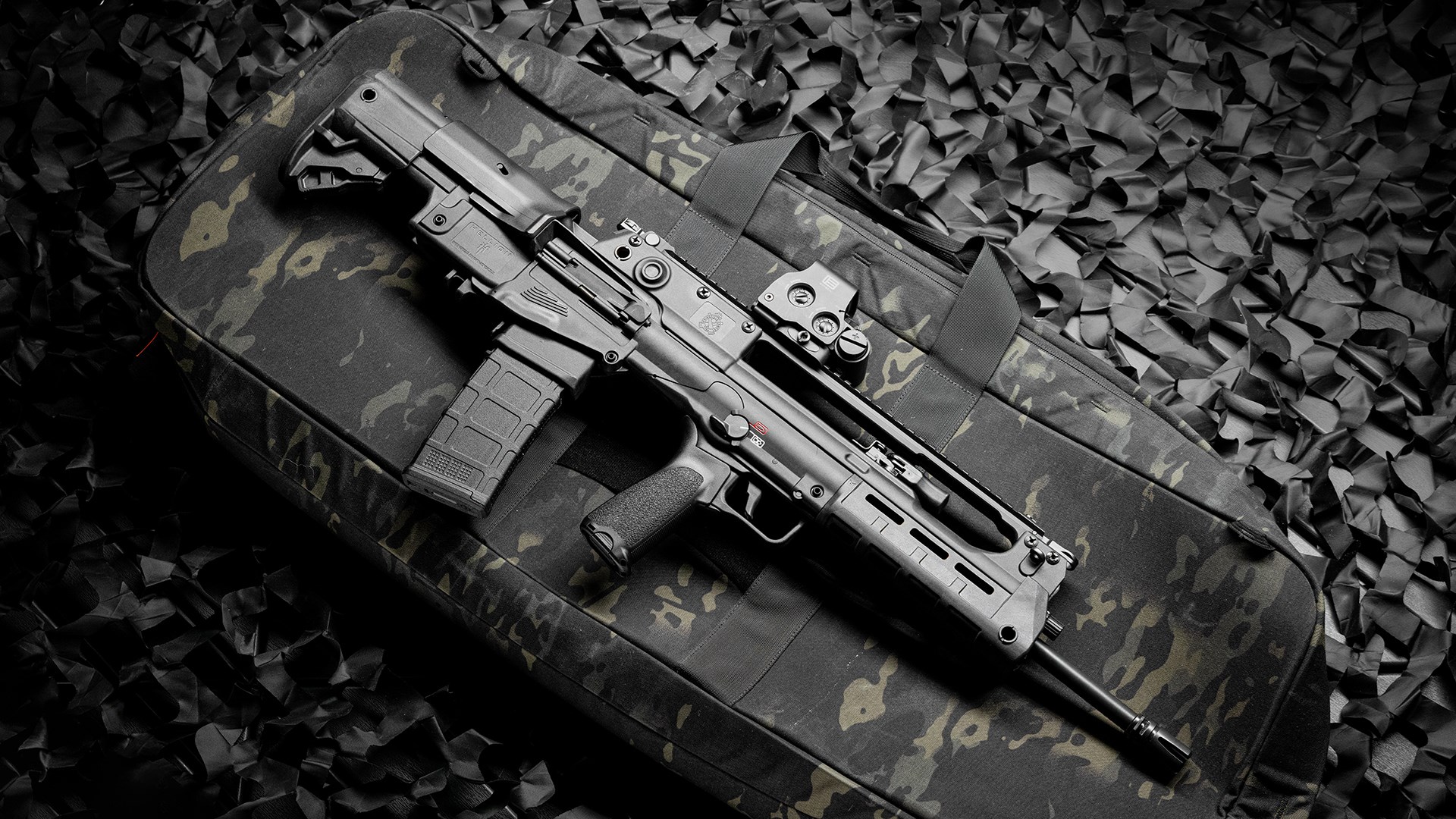 Right side of the Springfield Armory Hellion laying on a rifle bag.