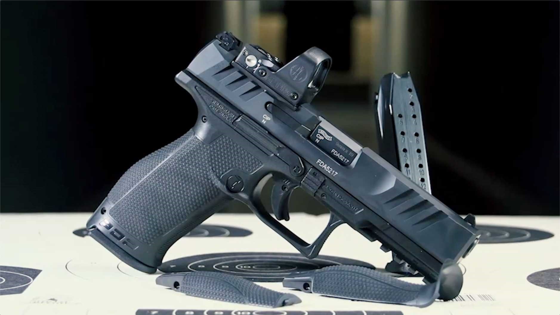The right side of a red-dot-equipped Walther Performance Duty pistol shown next to bullseye targets and interchangeable backstraps.
