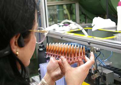 Hornady employee visually inspects A-Tip bullets