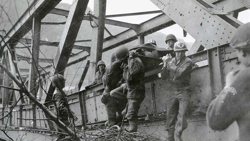 Medics evacuate wounded engineers after the Ludendorff Bridge collapsed on March 17th.