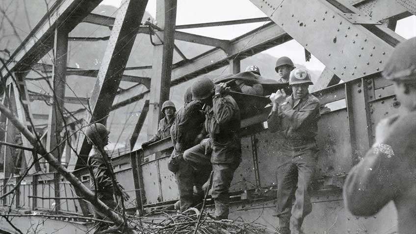 Medics evacuate wounded engineers after the Ludendorff Bridge collapsed on March 17th.