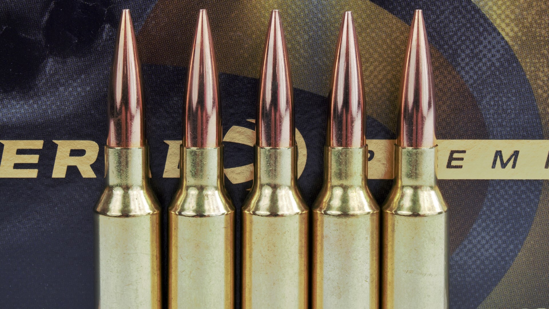 6.5 mm Creedmoor bullets cartridges upright stack arrangement left to right picket fence five pieces brass ammunition box federal premium