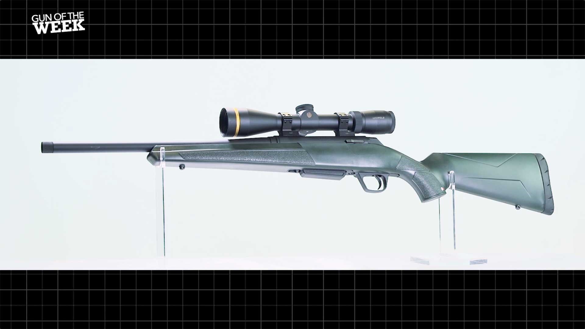 Left side of the Winchester XPR Stealth SR rifle, showing a green stock and a Leupold riflescope mounted.