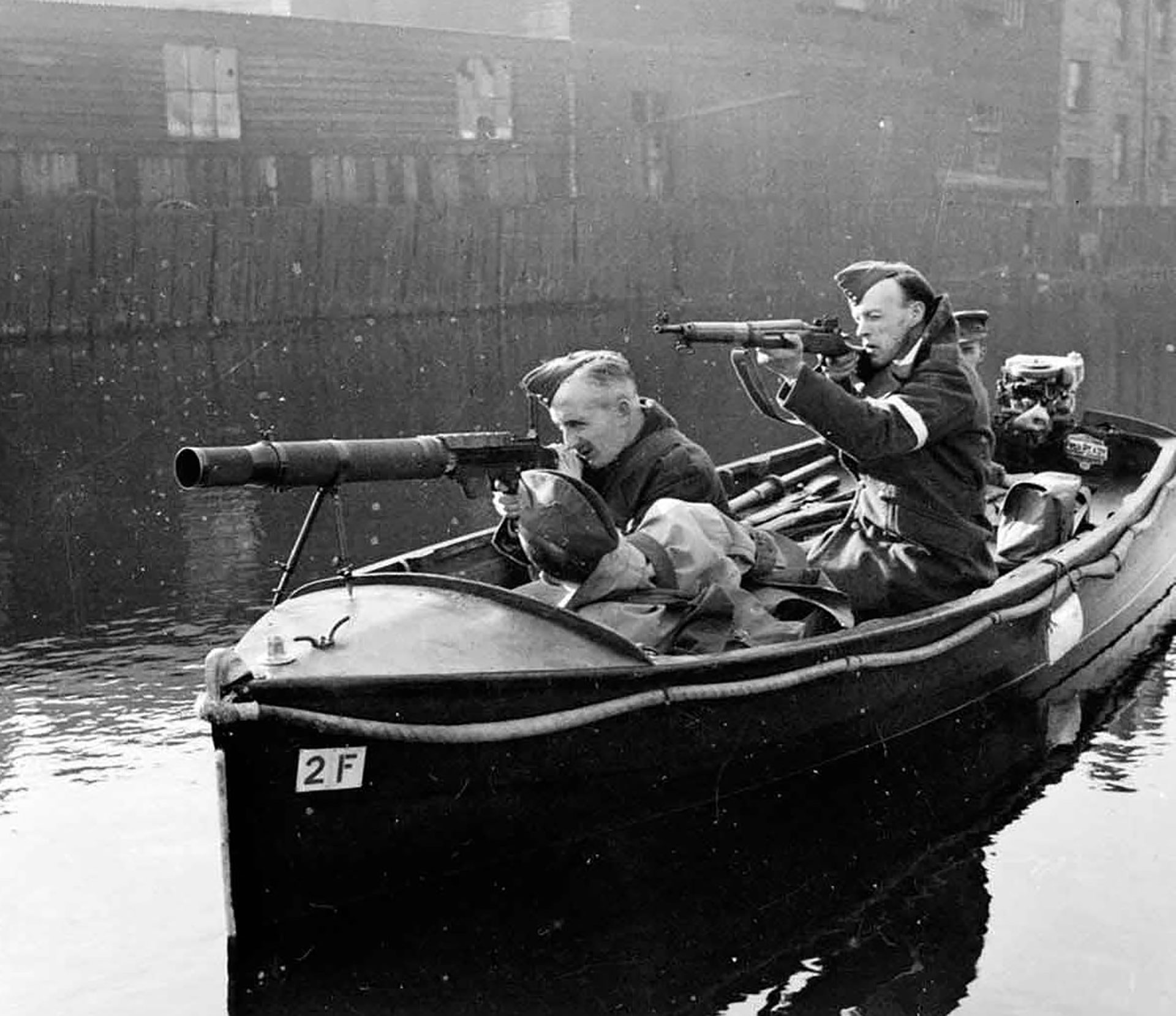 The Home Guard takes to Britain’s waterways with a Lewis machine gun and a P14 rifle.  The Lewis, a WWI holdover, proved to be an important weapon in England’s defense. NARA