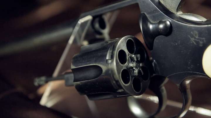 Close-up view of Colt revolver cylinder.