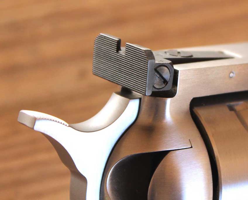 stainless steel revolver hammer sight gun parts closeup