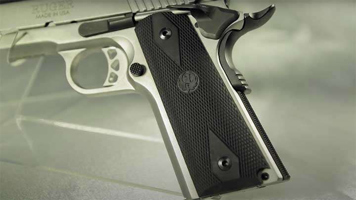 A closer look at the black rubberized double-diamond  grips that come standard on the SR1911.