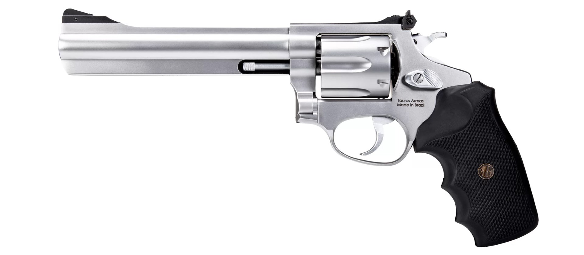 Left-side view full length on white of Rossi USA RM66 double-action stainless steel revolver chambered for .357 Mag. gun wheelgun black grips