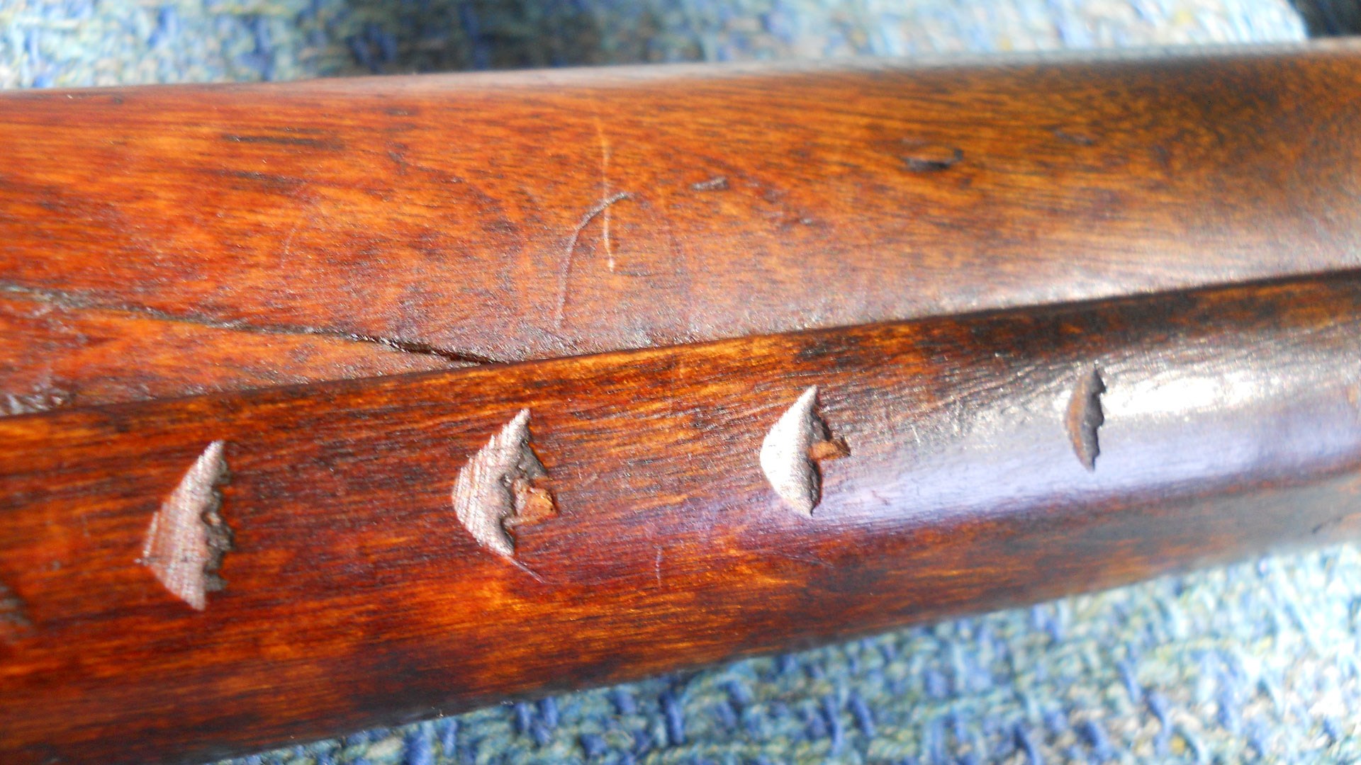 wood gunstock notches from war