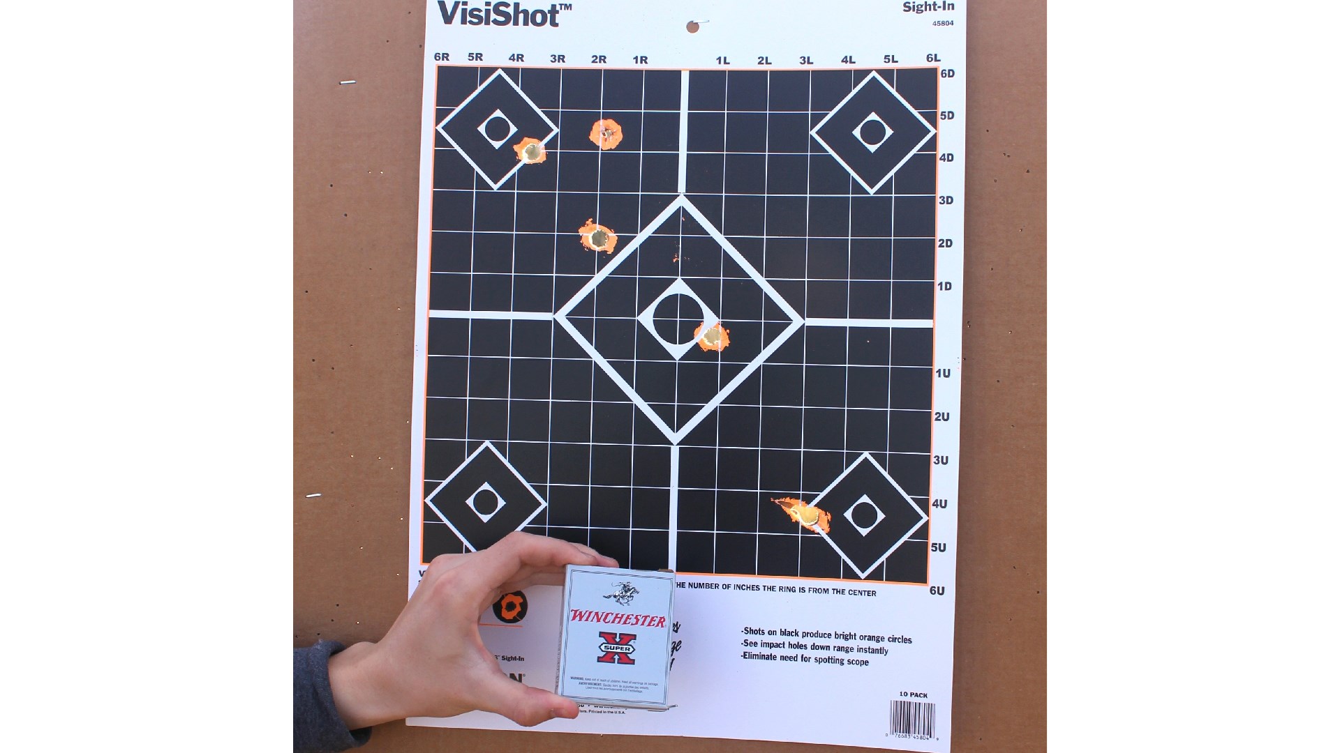 The five pellets of 000 buckshot came close to forming a diagonal line from the top left to the bottom right of the target area.