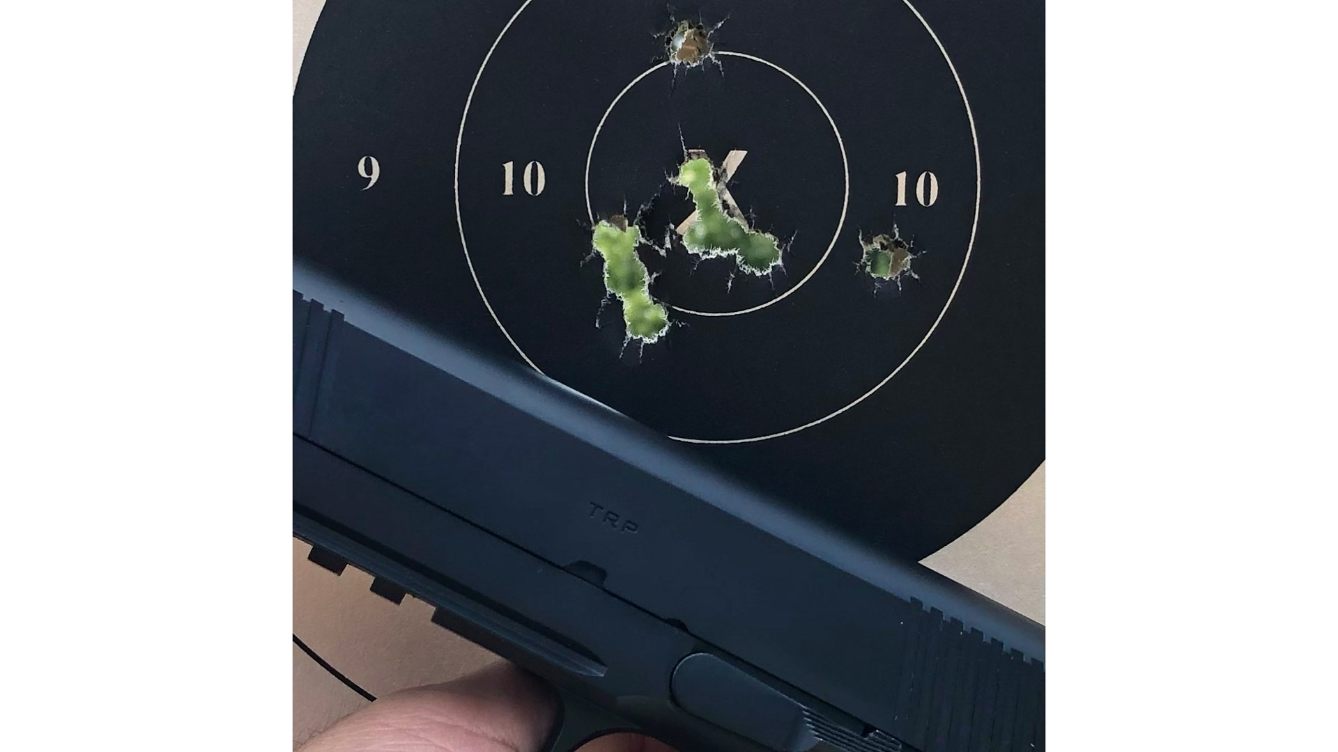 Springfield armory TRP 1911 bullseye group target holes accuracy black gun 1911
