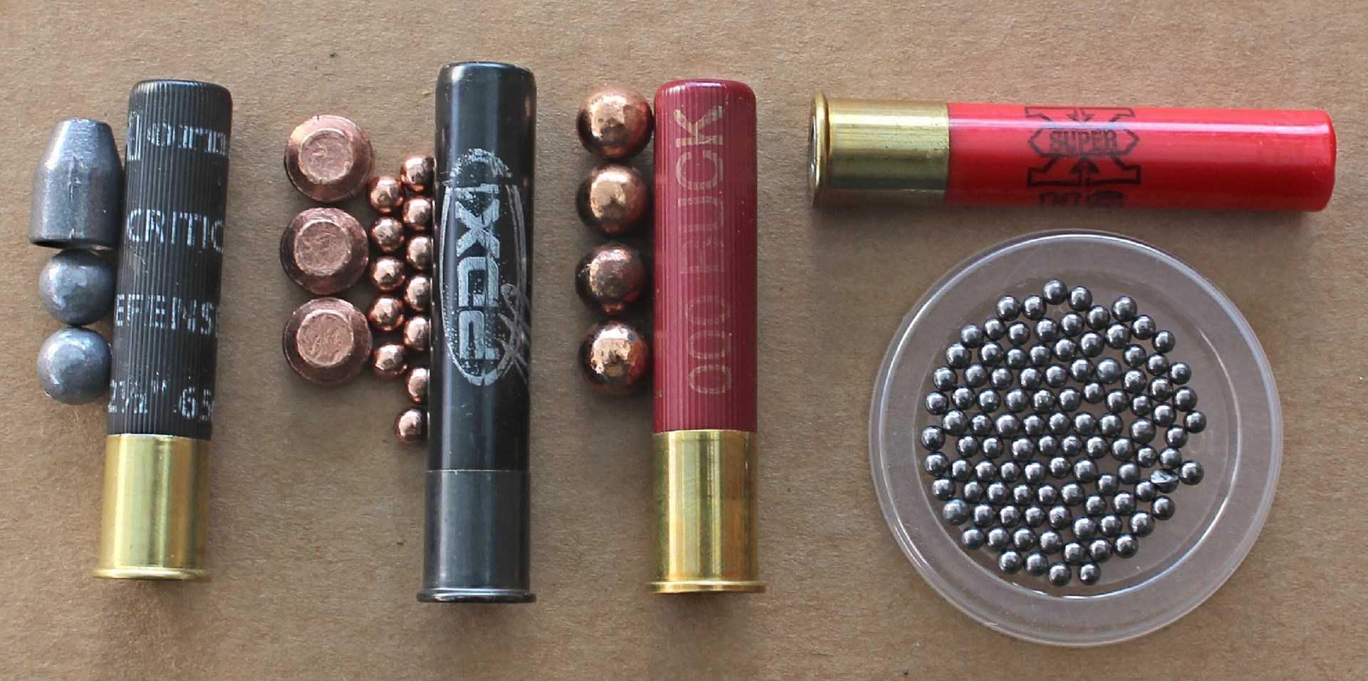 Three vertical and one horizontal shotshells on brown paper ammunition The popularity of the Taurus Judge inspired the development of mixed payload shot shells in addition to traditional buckshot and birdshot loads.