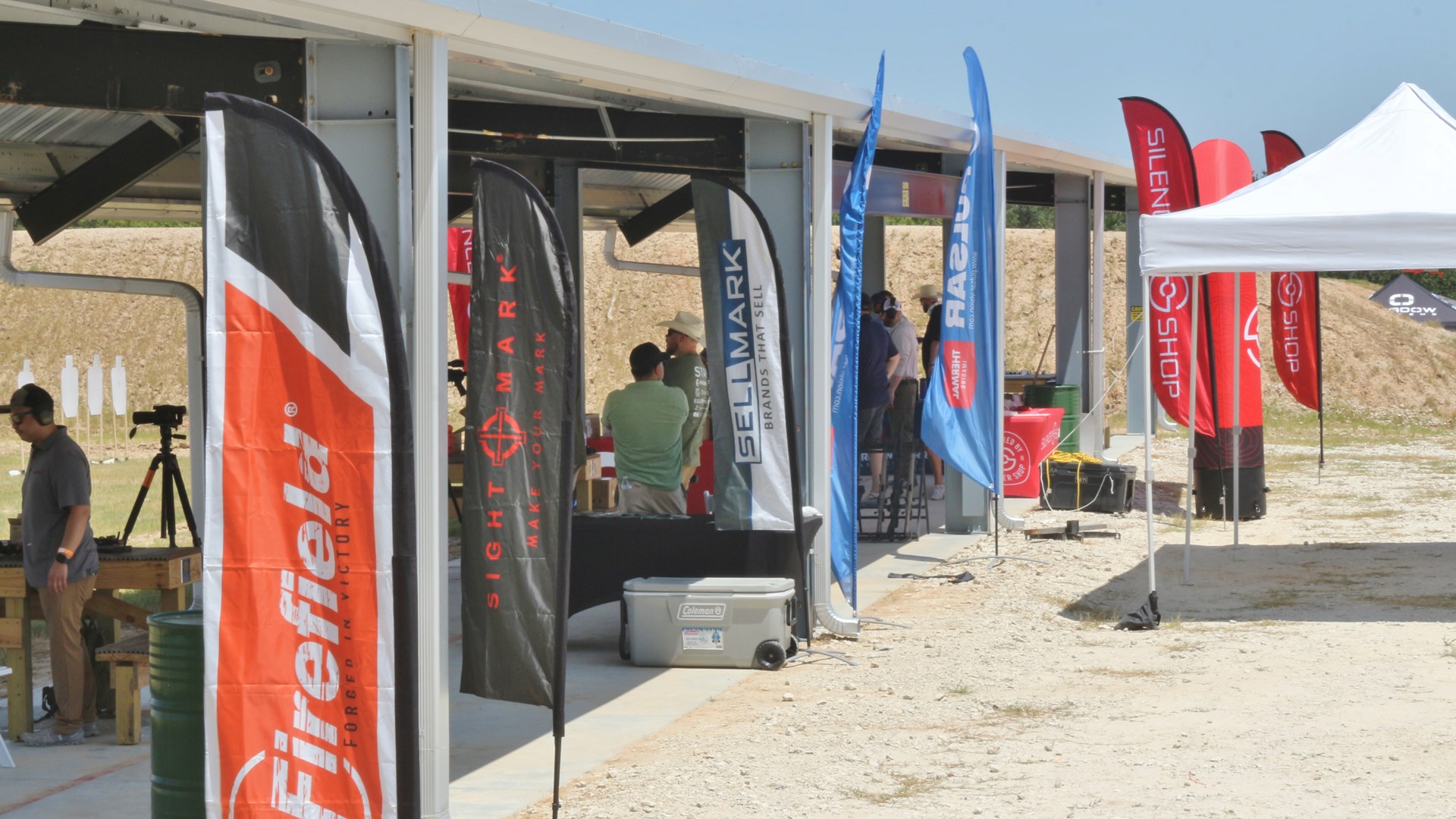 Sellmark Ranch Grand Opening celebration shooting line with banners and tents