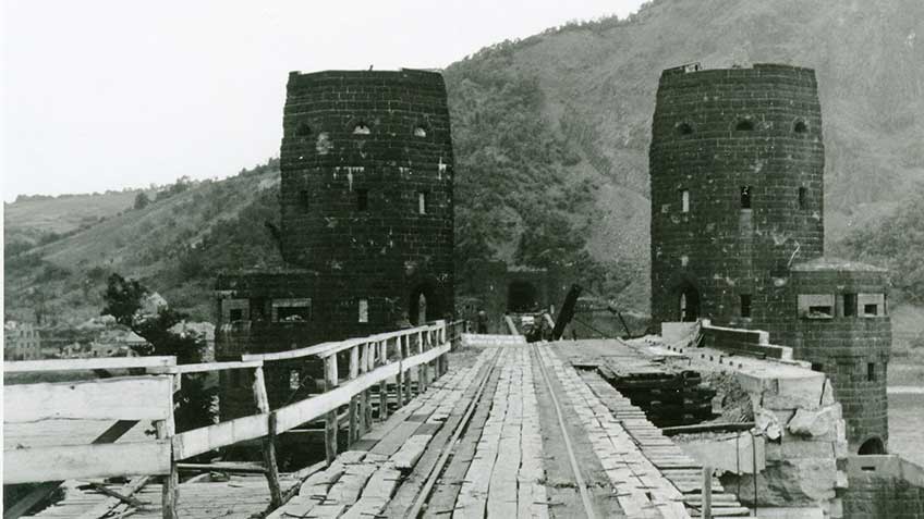 The approaches to the Ludendorff bridge showing the towers and the tunnel entrance on the opposite side of the river.  after its collapse on March 17, 1945.