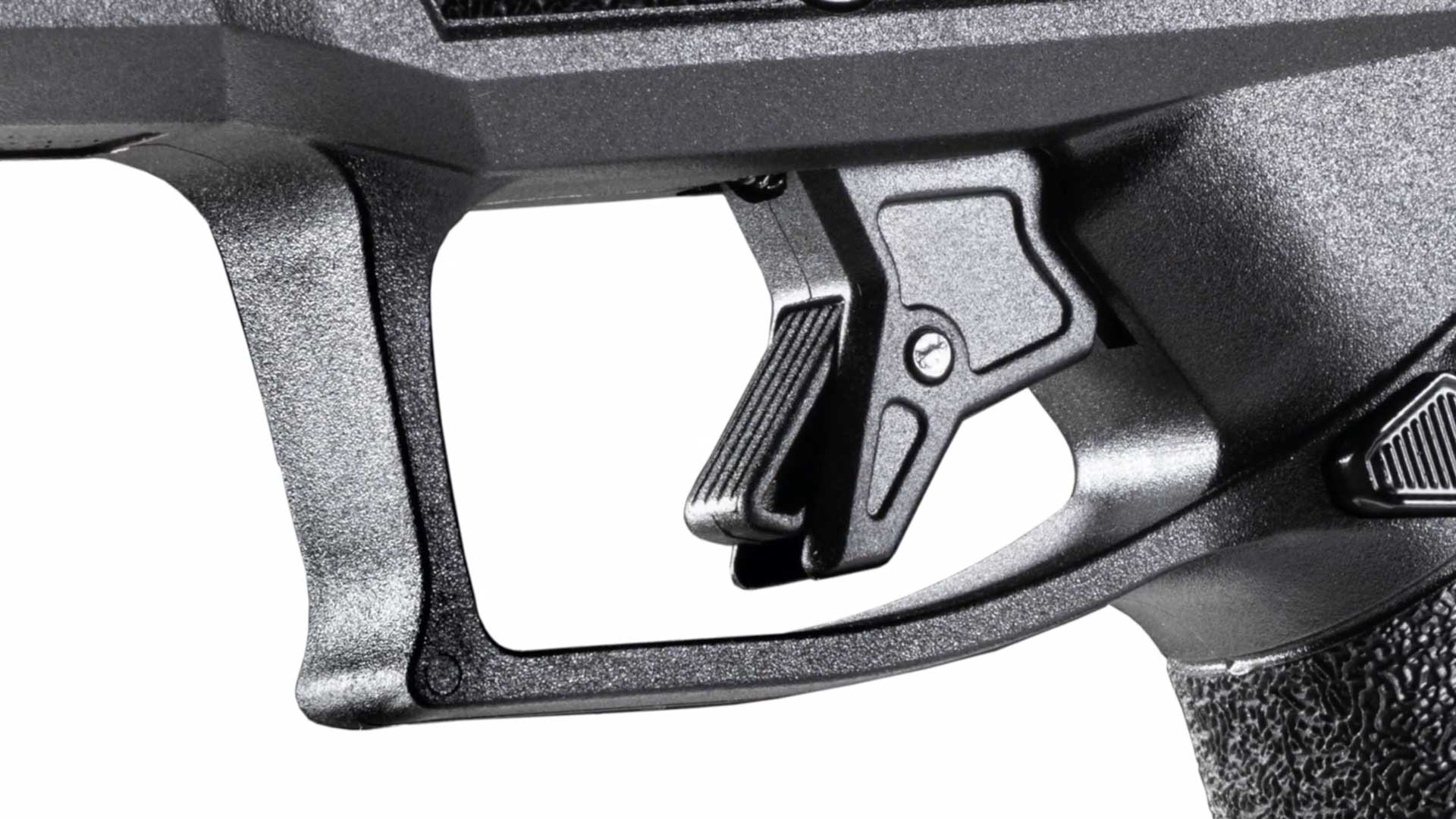 black plastic gun parts pistol texturing lever trigger handgun closeup details