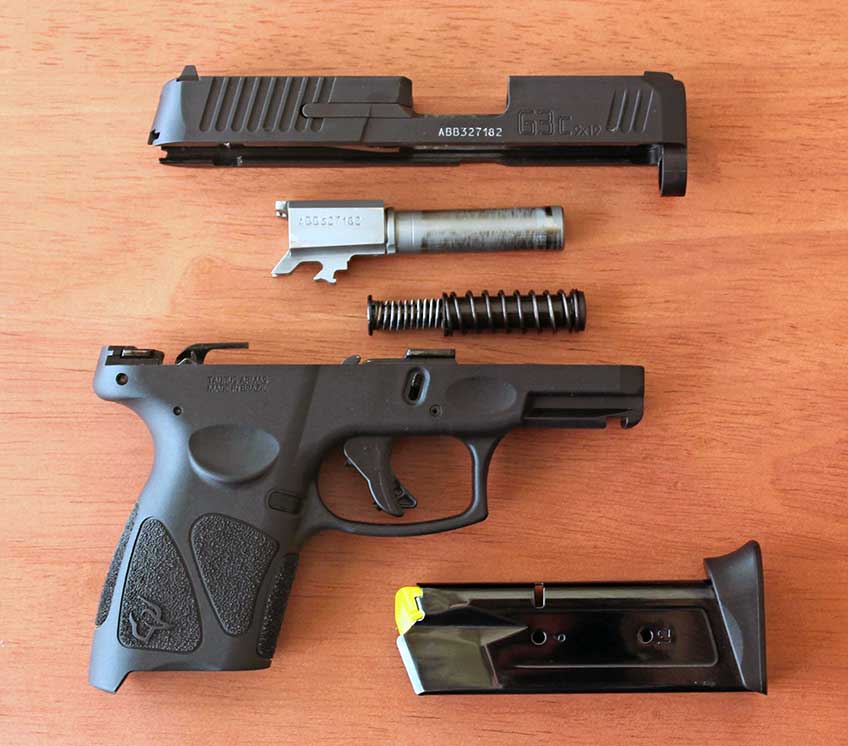 Taurus USA G3c right side handgun on table disassembled gun 9 mm