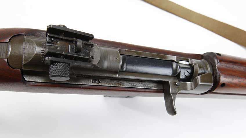 This Underwood Elliot Fisher M1 carbine in the NRA National Firearm Museum collection has the later ramped rear sight that partially obscures the serial number. On other models, the sight could obscure the serial number entirely, requiring arsenals to re-stamp the serial number elsewhere for easier visibility.