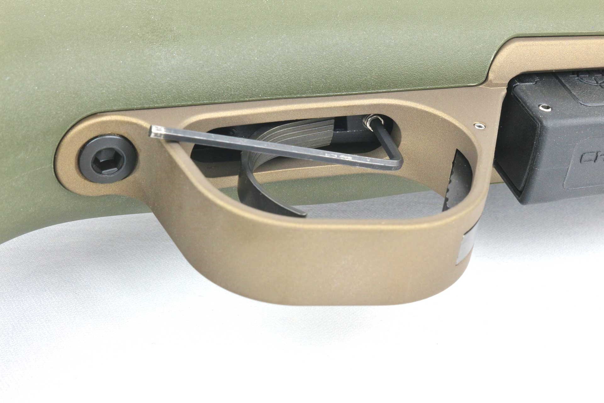 Allen key in the adjustment screw on the underside of the Christensen Arms Evoke bolt-action rifle.