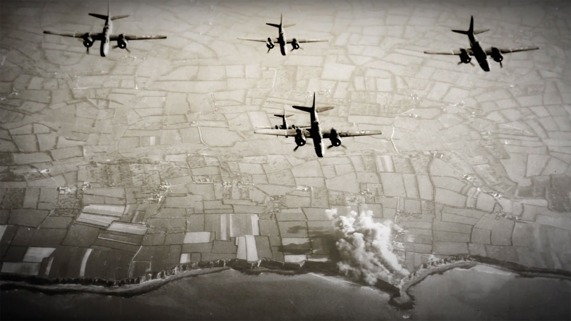 A photo of U.S. A-20 Havoc bombers during a bombing run over Pointe du Hoc before D-Day.