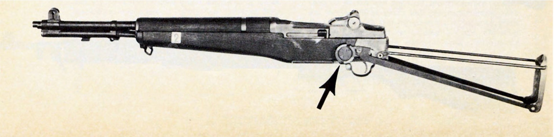 U.S. Rifle Cal. .30 M1E5 with Stock T6 (stock extended) and M15 Grenade Sight mounting plate (arrow).