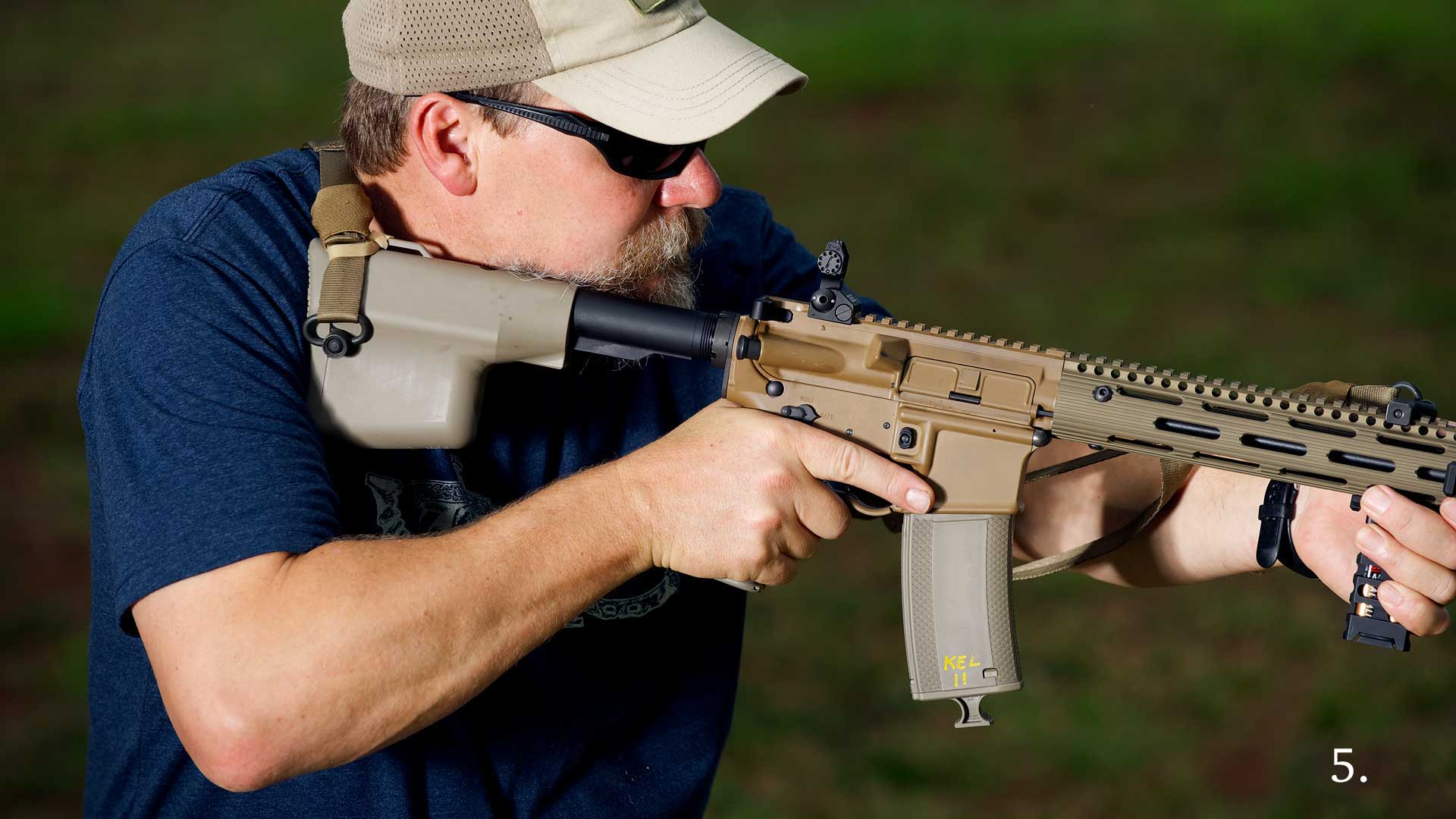 man gun rifle ar-15 shooting carbine