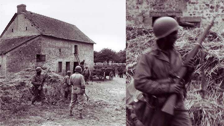 Soldiers from the 320th Barrage Balloon Battalion are seen here hunting a German sniper at a farmhouse in St.-Laurent-Sur-Mer in Normandy on June 10, 1944. The man at left is armed with an M1903A3 rifle.  (National Archives and Records Administration/U.S. Army Signal Corps 111-SC-332023).