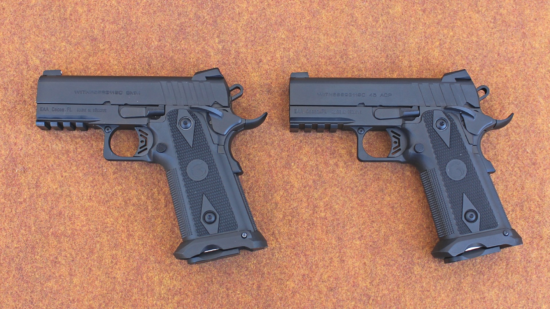 Left-side view of two EAA Brat handguns 9 mm and 45 acp shown for comparison of size on table