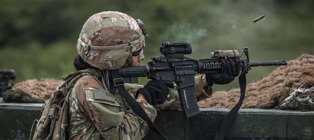 U.S. Army soldier firing rifle