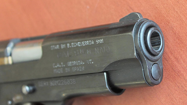 The roll marks and Century Arms import marks on the right side of the slide on the Star BM.