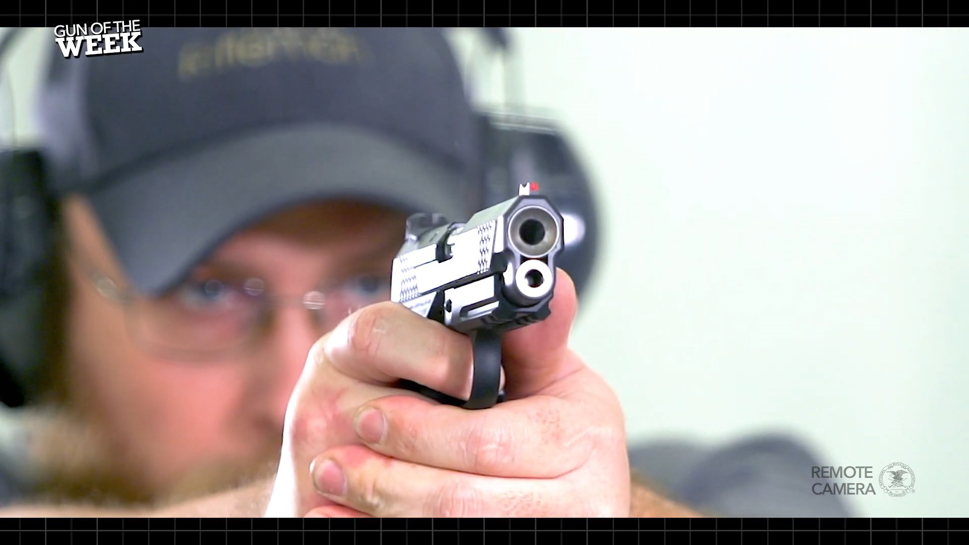 Wilson Combat SFX9 handgun pistol black gun on the range with man wearing protective gear
