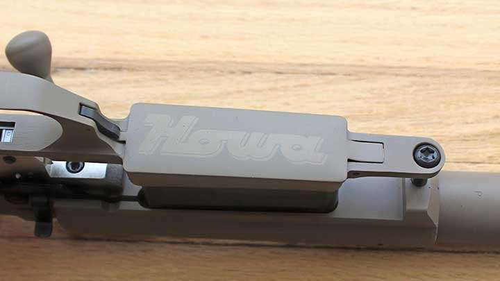 The floor plate of the Howa 1500 with Howa logo.