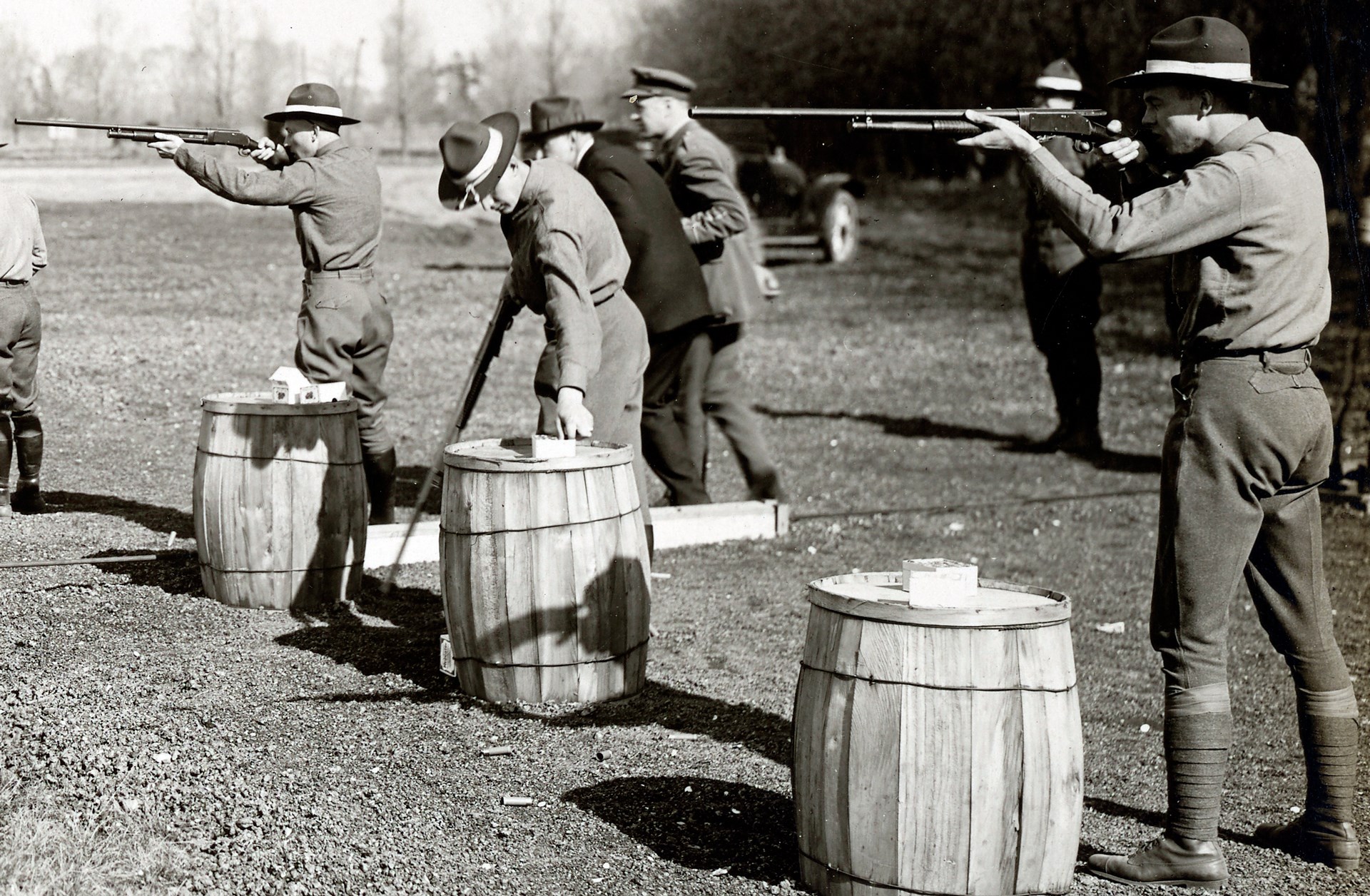 1)	Aerial gunnery training begins: Cadets skeet shooting with Winchester Model 1897 shotguns at the University of Illinois during the spring of 1918. National Archives And Records Administration (N.A.R.A.) photograph.