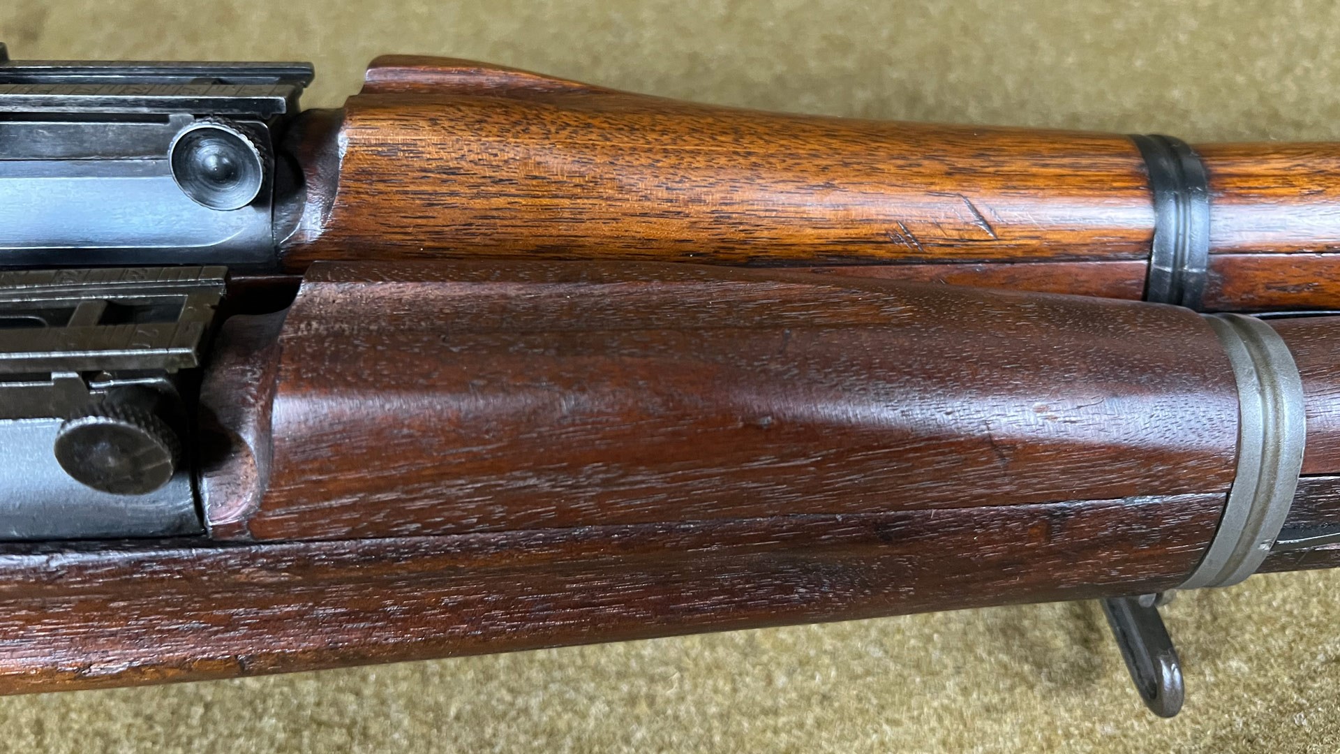 Comparison of two wood features on bolt-action military rifles